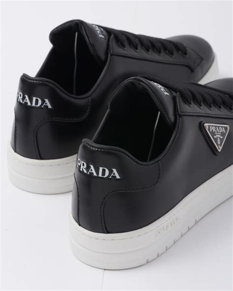 black painted prada trainers|prada black trainers women.